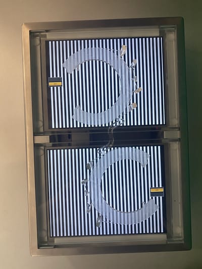 Controllo di trasmittanza su pezzi trasparenti